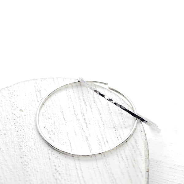 slim extra thin sterling silver hammered hoops by Meli Jewellery - The Greek Art Company