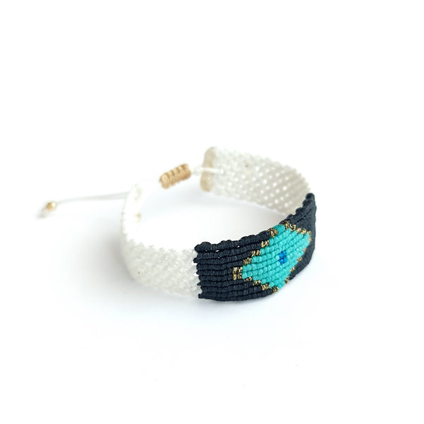 Makrame bracelet with a turquoise eye rhombus diamond shape by Irene Hussein - The Greek Art Company