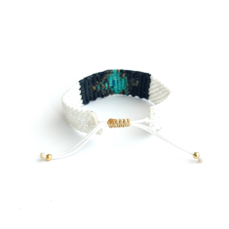 Makrame bracelet with a turquoise eye rhombus diamond shape by Irene Hussein - The Greek Art Company