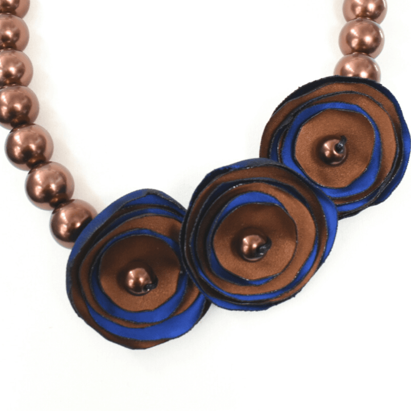 Statement Necklace with brown blue roses made of satin and brown beads by Dimitra Haratsi - Jewels My Way - The Greek Art Company