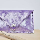 Symmetria clutch in iridescent suede leather in lilac purple color by Ana Koutsi - The Greek Art Company