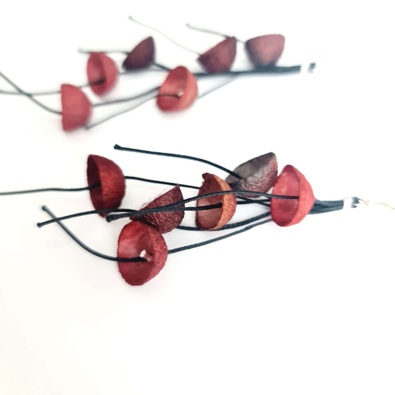 maroon long earrings made out of silk cocoons and silk cords by Dimitra Haratsi Jewels My Way - The Greek Art Company
